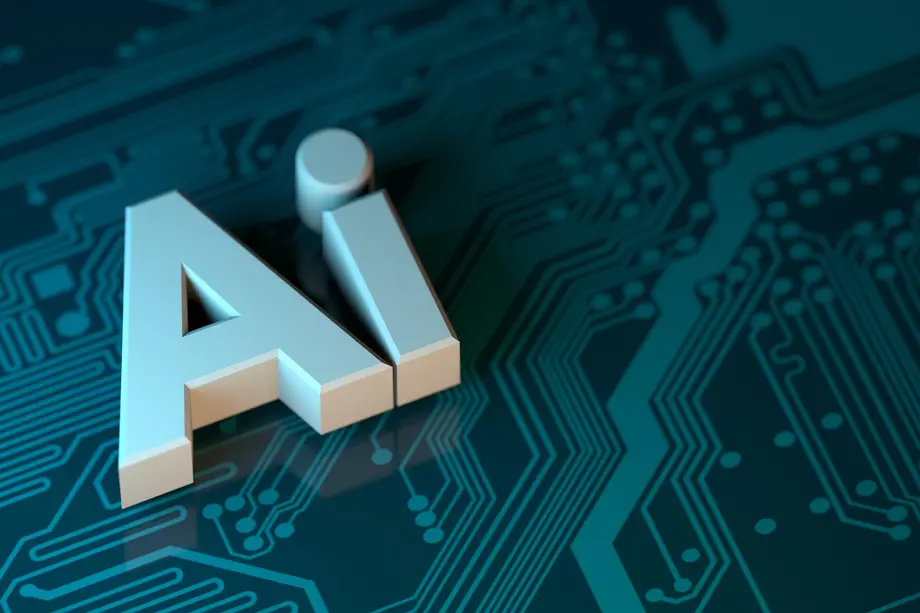 3D letters 'AI' standing on a circuit board, representing artificial intelligence technology and its integration with modern computing.