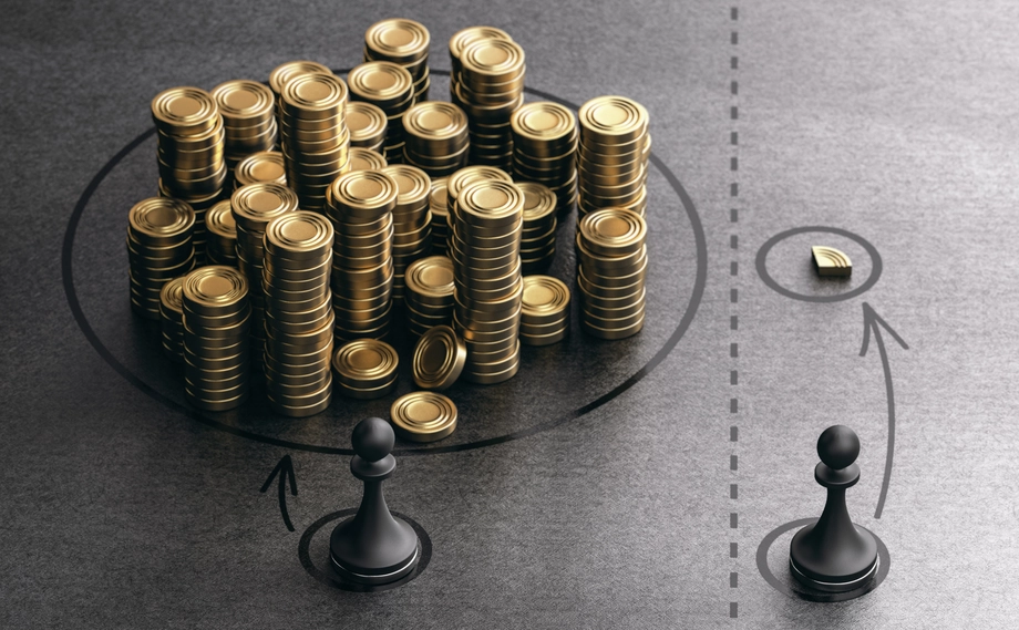 Conceptual image of two chess pawns on either side of a dotted line, one near a large stack of gold coins in a circular pattern, and the other facing a single coin, symbolizing disparity in wealth distribution.